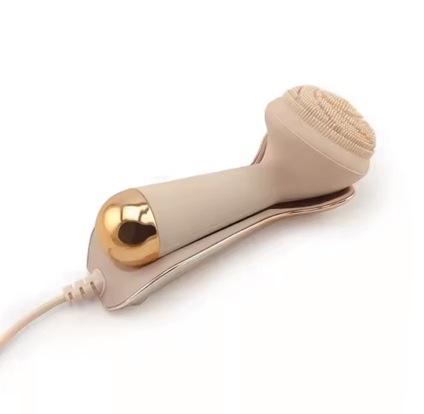 Bylyss Facial Sonic Cleanser with gold accents and charging dock for luxurious, deep skincare cleansing